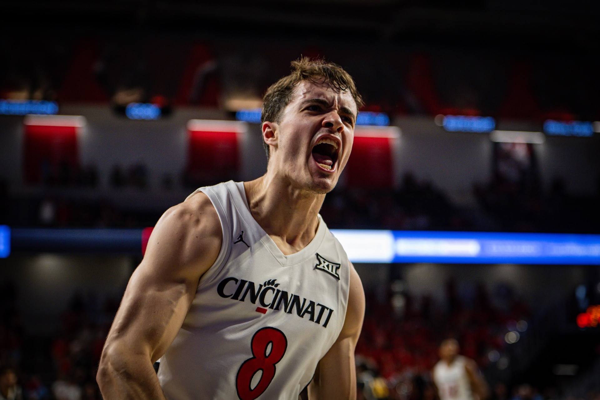 Connor Hickman celebrating in a Cincinnati jersey